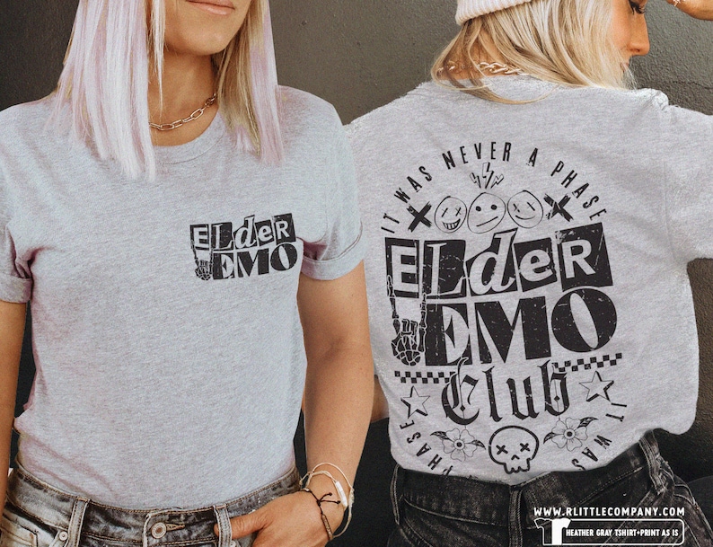 May include: Gray t-shirt with black text that reads "It was never a phase" and "Elder Emo Club". The text is in a distressed font and includes a skull and crossbones graphic.
