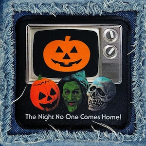 May include: A black and white patch with a vintage television screen showing a jack-o-lantern. Below the screen are three more jack-o-lanterns, a green witch, and a skull. The text "The Night No One Comes Home!" is at the bottom of the patch.