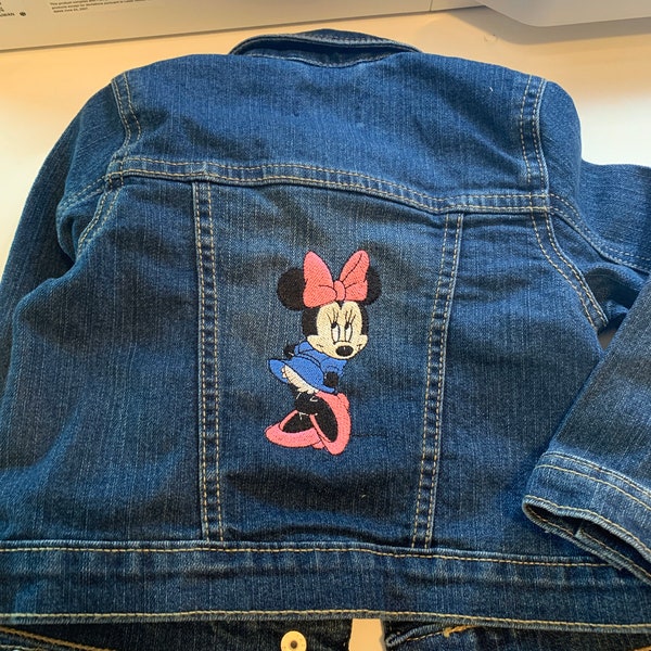 Child’s size 2t Jean jacket with Minnie Mouse