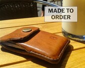 Leather card and bank notes wallet. Pocket size