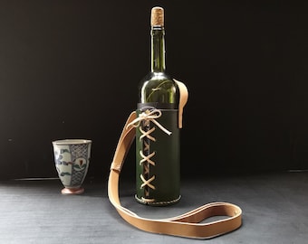 Leather water or wine bottle carrier