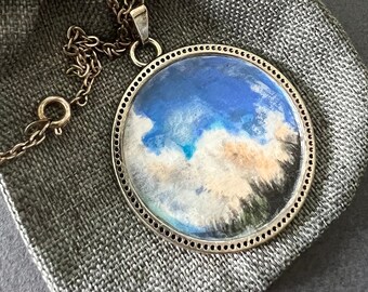 Hand painted pendant, metal jewelry sliver color, necklace with 18 inch chain, blue skies, clouds
