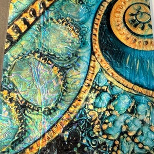 May include: A set of three ceramic mugs with a speckled, matte finish in cream, light grey, and dark grey. Each mug has a simple, minimalist design, ideal for coffee or tea.