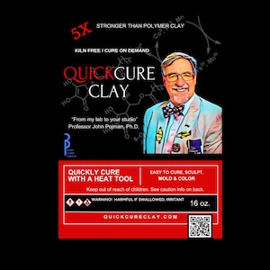 May include: A white ceramic mug with a black handle and the text "But First, Coffee" in a bold, black font. The mug is set against a blurred background, suggesting a cozy setting.