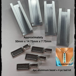 May include: Four silver-toned aluminum bezels and four silver-toned bail kits. The bezels are approximately 50mm x 14.75mm x 7.75mm. The bezels have a textured surface. The bail kits have a loop on one end and a flat surface on the other end. The bezels and bail kits are used for making jewelry.