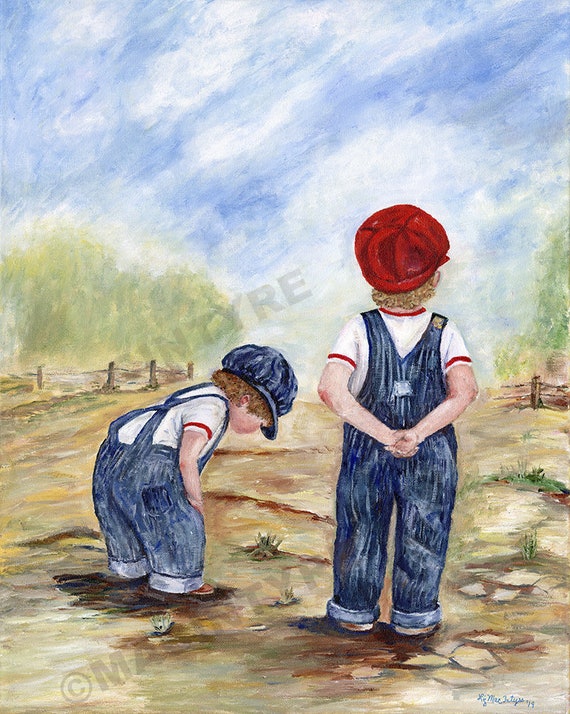 little boy in overalls