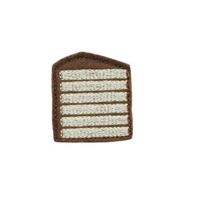 May include: Brown felt patch with white embroidered stripes.
