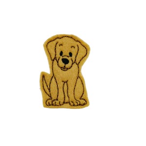 May include: A brown felt applique of a sitting dog with black embroidered eyes and nose.