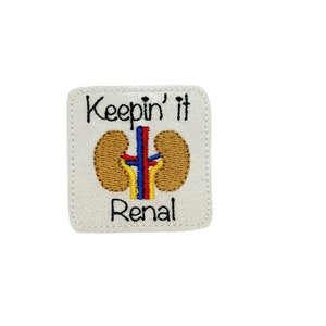 May include: White embroidered patch with a kidney illustration and the text "Keepin' it Renal".