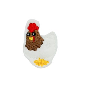 May include: White felt applique of a brown chicken with a red comb, black eyes, and a yellow beak. The chicken is facing left and has a yellow foot.