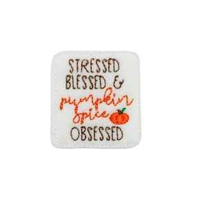 May include: White felt patch with brown embroidery that reads "Stressed Blessed & Pumpkin Spice Obsessed" with a small orange pumpkin graphic.