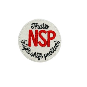 May include: White round patch with red embroidered text "NSP" and black embroidered text "That's night shift problem".