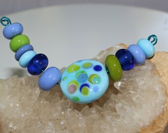 Handmade Lampwork Glass Rondelle Beads – Aqua Blue With Flower Swirl Dots, 15mm, 2mm Hole