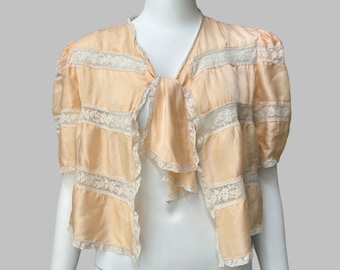 1930’s Peach Silk and Lace Puff Sleeve Bed Jacket | Antique Cropped Open Front Silk Jacket with Scarf Tie and Lace Inserts