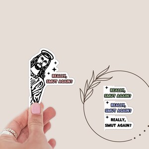 May include: A sticker featuring a black and white illustration of Jesus with the text "Really, Smut Again?" repeated four times in different colors.