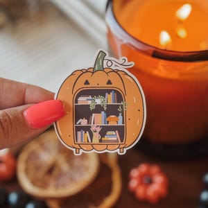 Bookshelf Pumpkin Sticker: Spooky Bookish Halloween Decor