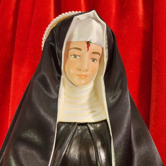 DESPERATE (The Wallz are CAVIN' in) Situations? Pray to St. Rita of Cascia. 26"