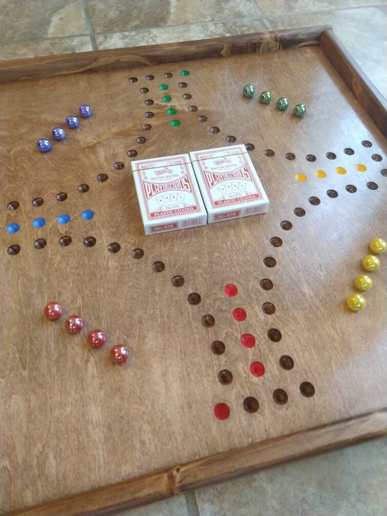 Pegs and Jokers, Marbles and Jokers, 4 player pegs and Jokers, Jokers