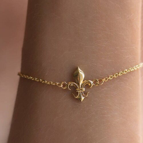 Gold Toggle Bracelet w/ Fleur De Lis Lock main image 0
