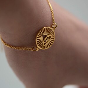 Egyptian Bracelet Eye of Horus/ Eye of Ra 18k Gold Plated with adjutable chain. Handmade. Egyptian symbols of protection.