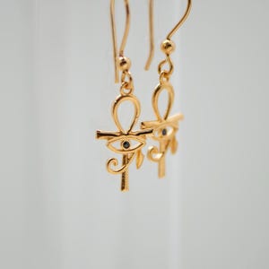 Eye of Horus and Egyptian Cross (Ankh cross) Earrings in 18K Gold plated, handmade. Ancient Egyptian symbolism. Eye of Ra.