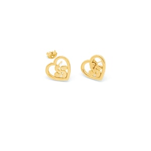 May include: A pair of gold heart-shaped earrings with a delicate floral design inside each heart.
