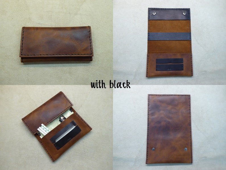 May include: A brown leather cigarette case with black stitching and a black flap. The case is open to reveal a black interior with two slots for cigarettes. The case is closed in the other images.