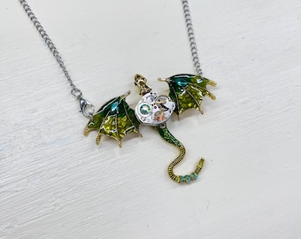 Steampunk necklace-Bejeweled vintage watch movement on green enamel dragon