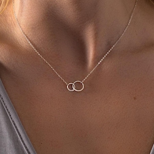 Unity-ketting: bedel met oneindige cirkels, sterlingzilver, minimalistisch