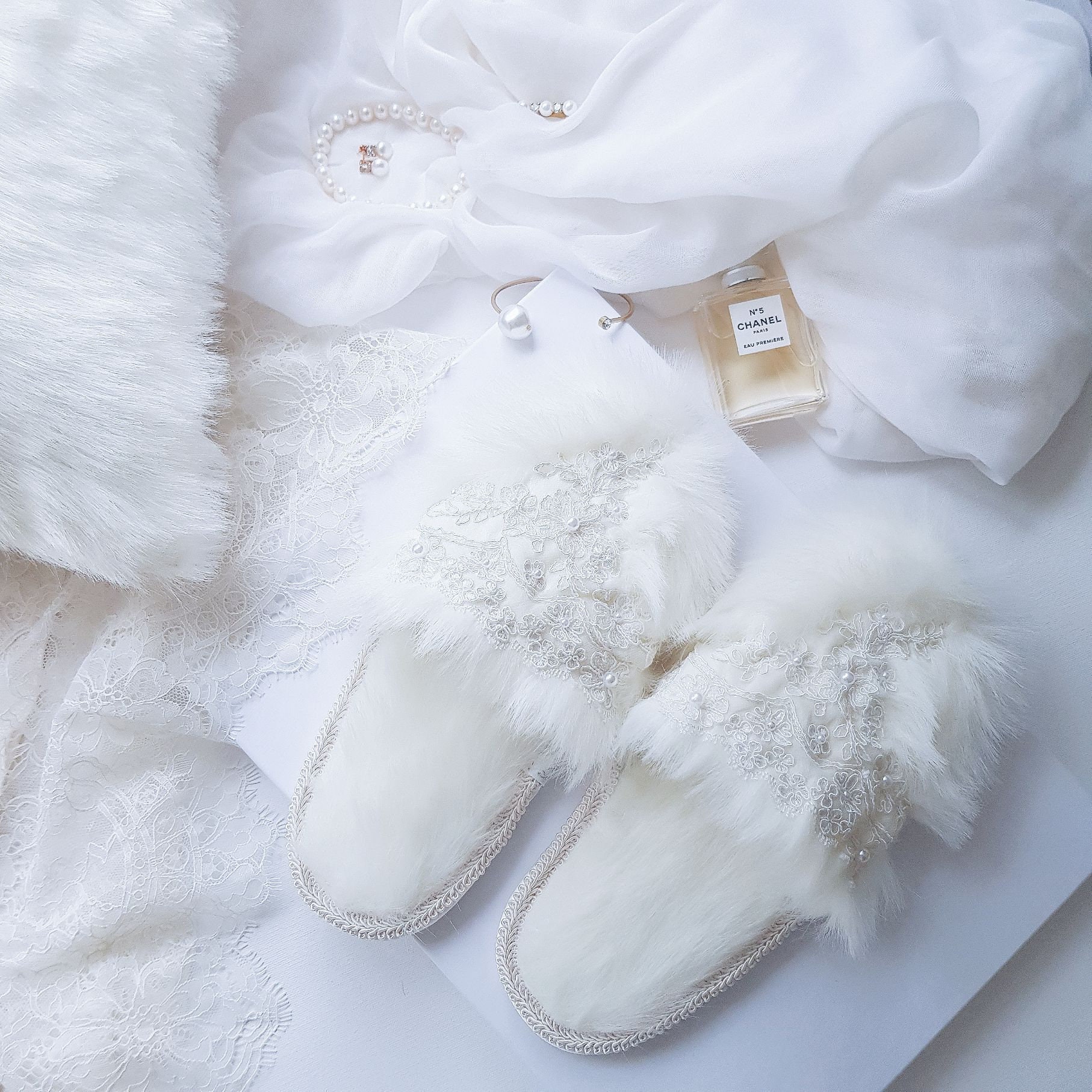 white fur slippers