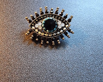 Jolie broche porte bonheur Oeil de protection