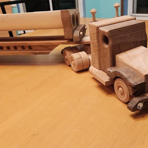 Tractor and side dumper trailer