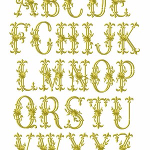 May include: A gold alphabet with ornate floral designs. Each letter is decorated with small flowers and leaves.