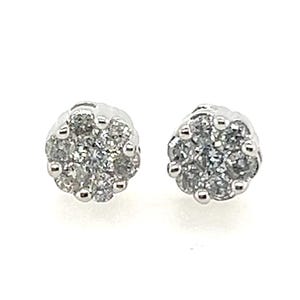 May include: A pair of silver stud earrings with a cluster of small diamonds in a circular shape.