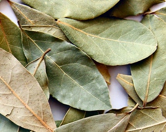 May include: A collection of dried bay leaves, a common culinary herb, with a variety of shades of green and brown.