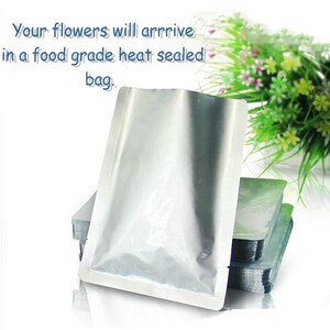 May include: A silver food-grade heat-sealed bag.  Your flowers will arrive in a food grade heat sealed bag.