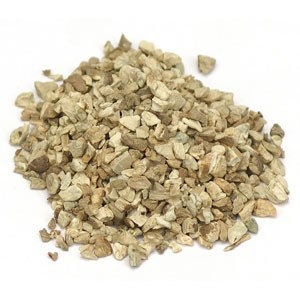 May include: A pile of dried, light brown, irregularly shaped pieces of angelica root.