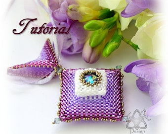 Tutorial en PDF del colgante y fiador Ojo de la Atlántida, con biconos de cristal y Rivoli de cristal. Solo en inglés.