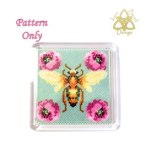 May include: A square beaded design showing a bee with yellow wings and a brown body, surrounded by pink flowers on a light blue background. The text "Pattern Only" is in pink script. The design is set in a clear, square frame.