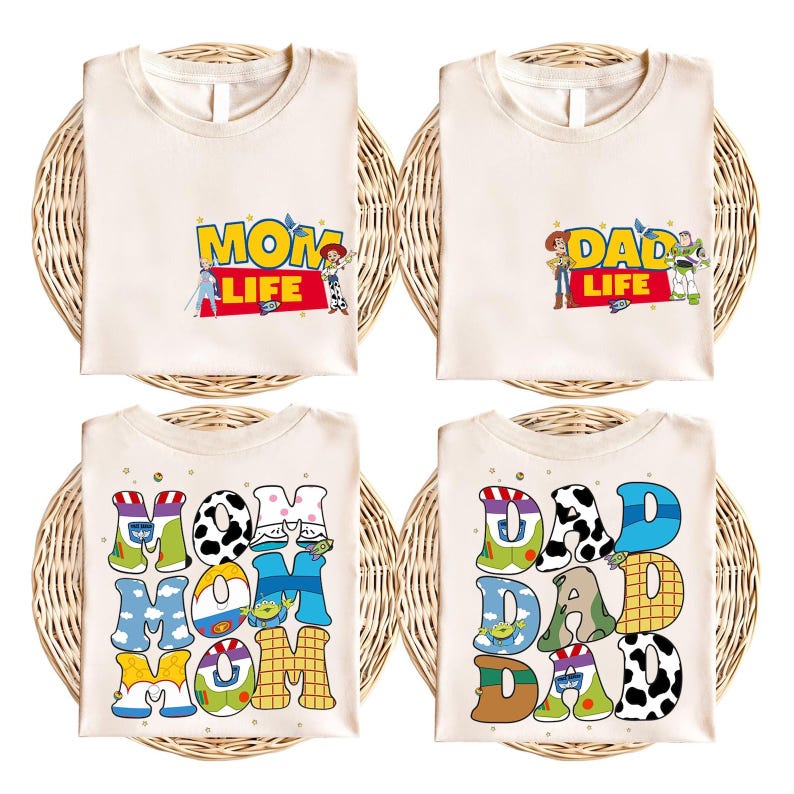 four different t-shirts, each with a unique design related to the characters from the Toy Story movie. The t-shirts feature the characters Mom, Dad, and various other characters from the film, along with the words "MOM LIFE" and "DAD LIFE" printed on them.