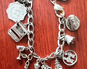 Rare vintage sterling charms bracelet 925 articulate