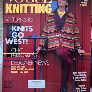 May include: Vogue Knitting International magazine cover featuring a woman wearing a colorful striped sweater and a black skirt. The cover text reads "VK Turns 10!" and "Knits Go West!"