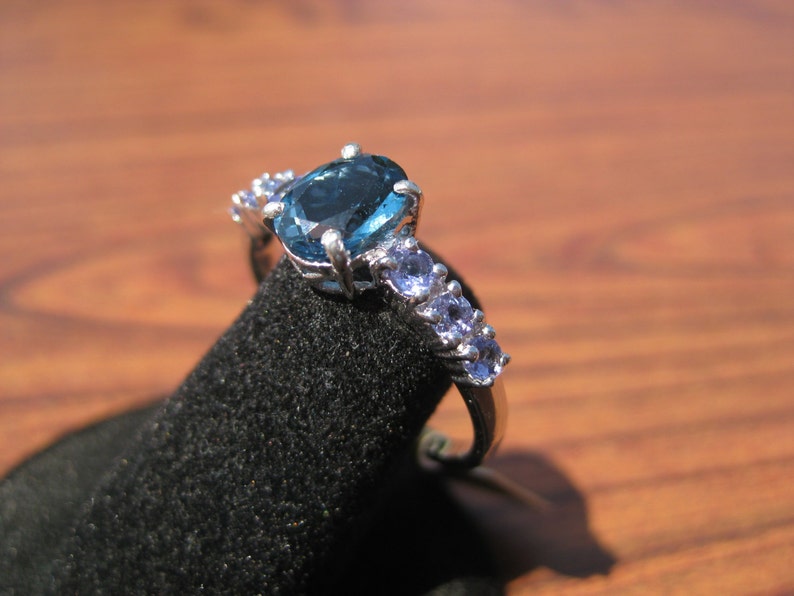 London Blue Topaz 8x6mm and Tanzanite Gemstones set in a Sterling Silver Ring with Platinum Overlay Size 9.25, No. 1496. image 1