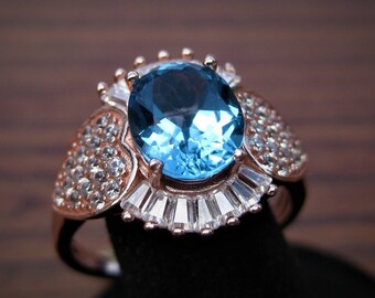 Blue Topaz (10x8mm) Faceted Gemstone Sterling Silver Ring with CZ Accents and Rose Gold Overlay Size 10.75, Item #1728