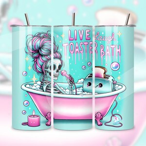 May include: A turquoise tumbler with a skeleton in a pink bathtub with a toaster in it. The text on the tumbler reads "Live Laugh Toaster Bath".