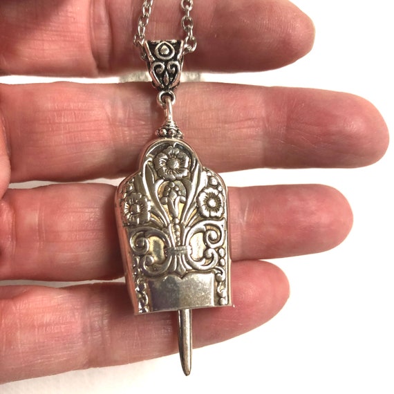 Angel bell best sale necklace