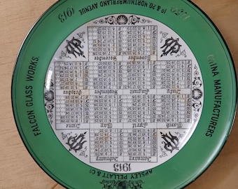 Falcon Glassworks Memorial Calendar Plate Advertisement