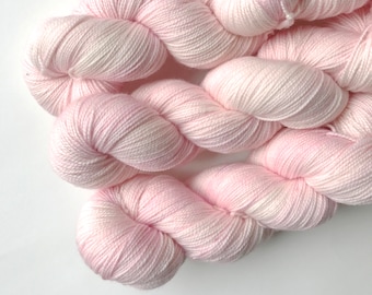 Hand Dyed Yarn. Fingering Weight. 400 yds. Gigi Bonin. Palest Pinky Nail