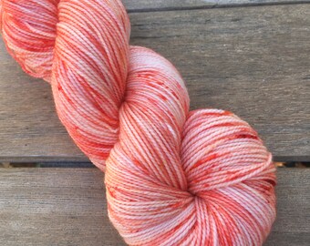 Hand Dyed Yarn. Orange Speckled. Merino. 400 yds. Fingering. Gigi Bonin. Key West Sunset