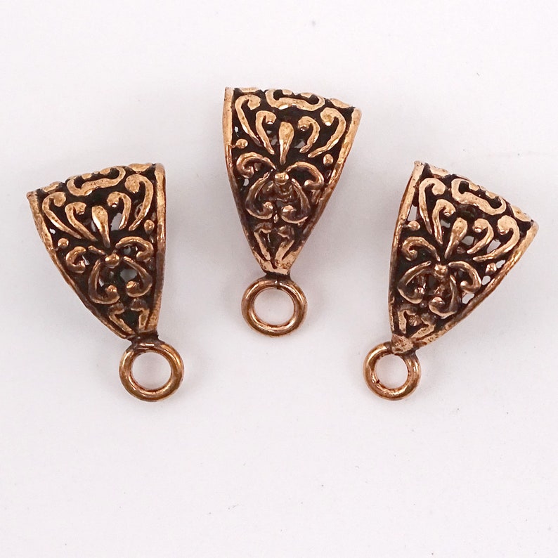 | 53-7636 Solid Copper Closed Loop Bail Lotus Flower Pattern--21mm L --1 Pc 78